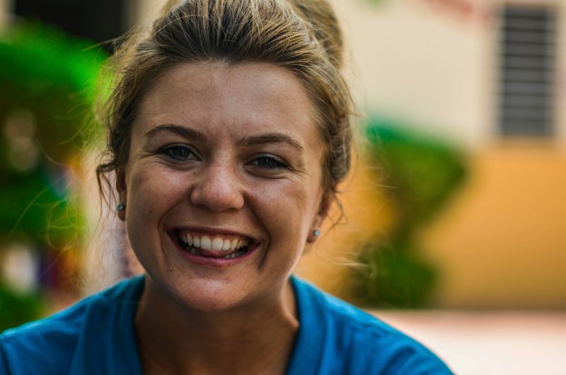 Woman with a big, confident smile